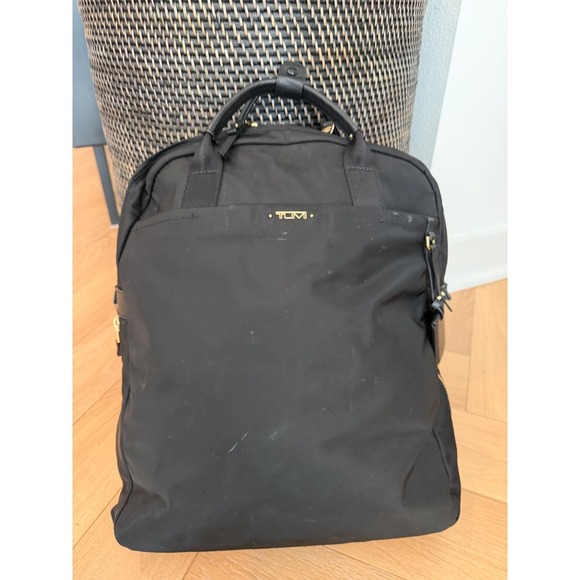 backpack or tote for travel Eddie Bauer 30L Bygone Multipurpose Convertible Tote, Black | Bag | Work | Laptop and Commuter Bag | Gym a padded laptop sleeve festival-accessory 01 CHOOSE PRODUCT COLOR:Rage Red/ Asphalt Grey Timbuk2 Robin Pack in
